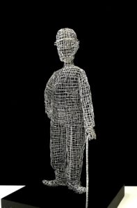 "CHARLIE CHAPLIN in CHARLOT" sculpture semi face gauche dim. H53/L24/19 cm